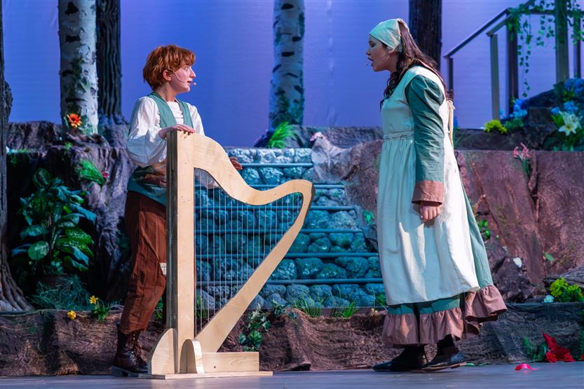 Students perform onstage